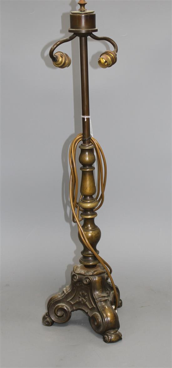 An early 20th century French bronze lamp base, lacks shade, height 71cm